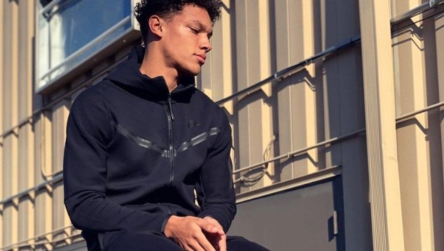 Styling the Black Nike Tech Suit